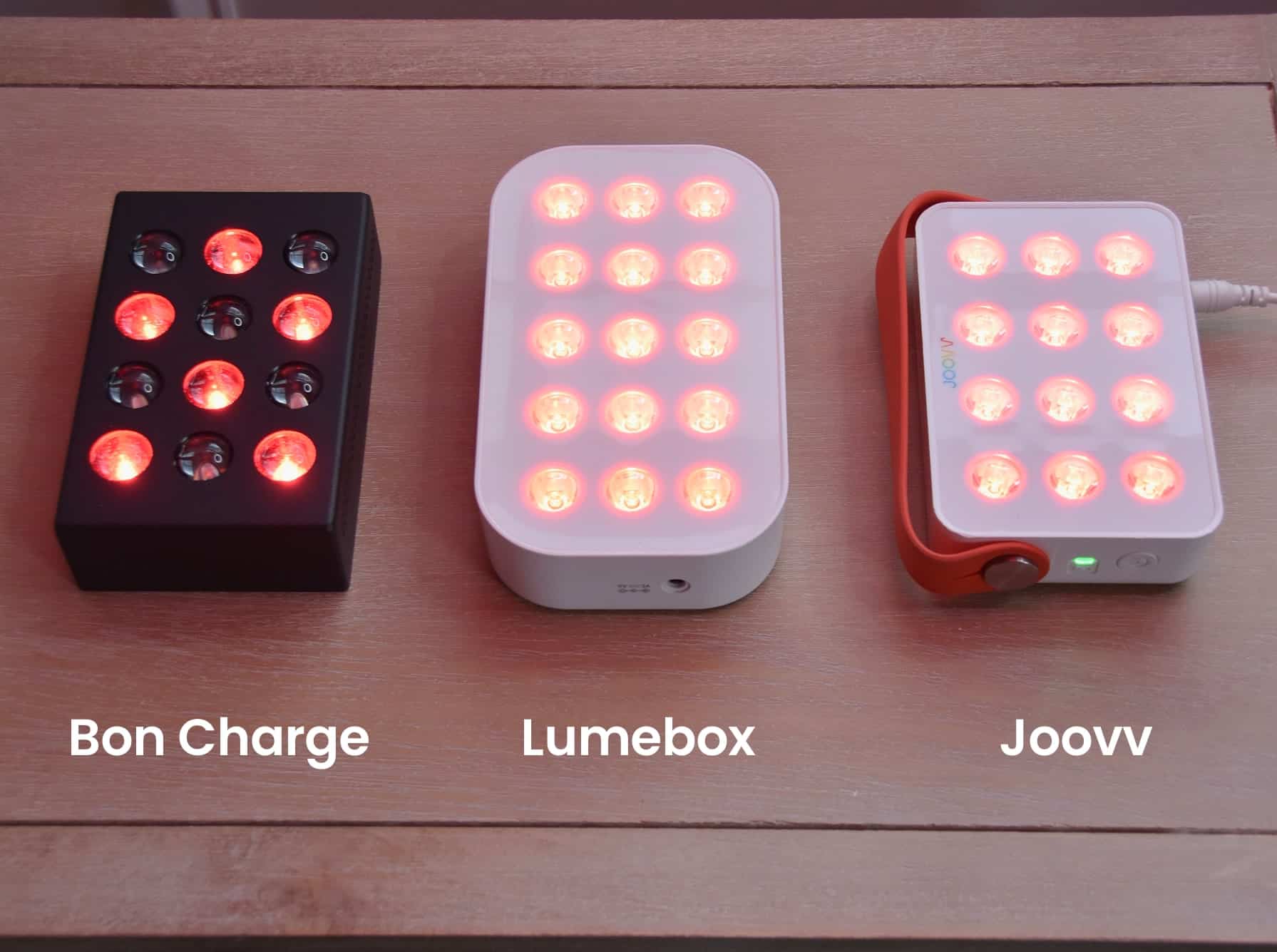 Lumebox vs Joovv vs Bon Charge red light therapy devices when turned on.