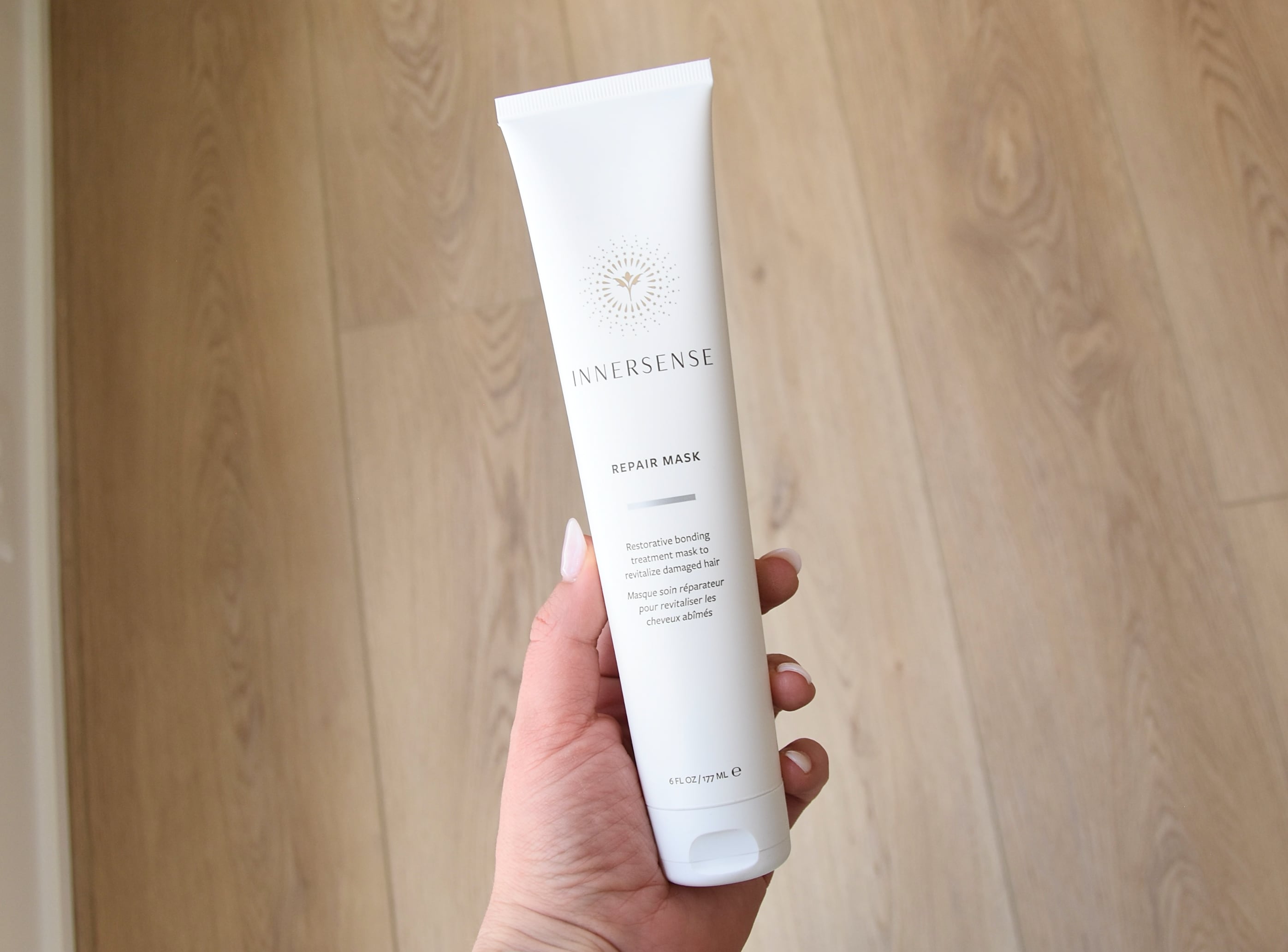 Holding the Innersense Repair Mask for review.