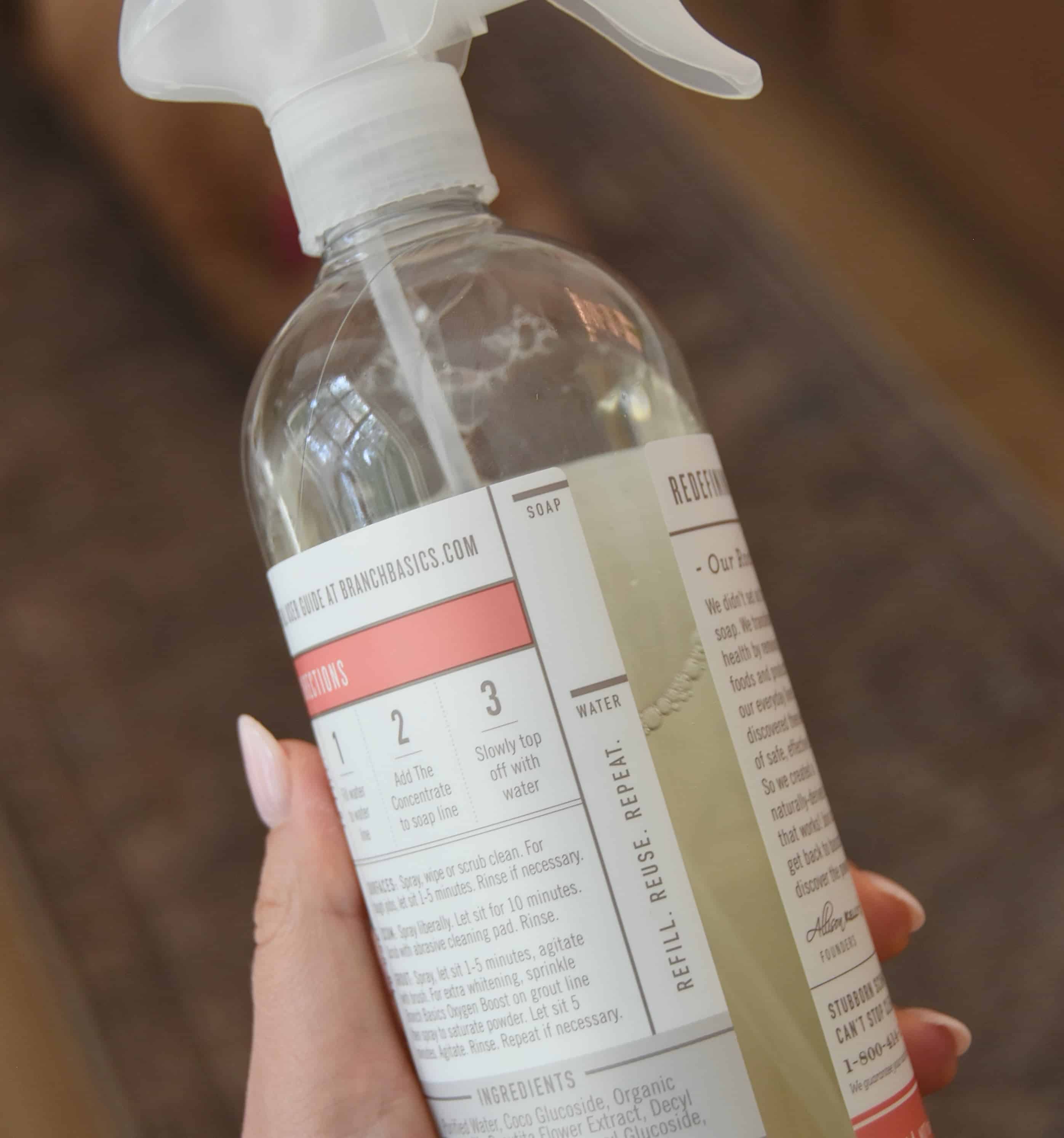 A close up shot of the bottle showing the water line and the soap line.