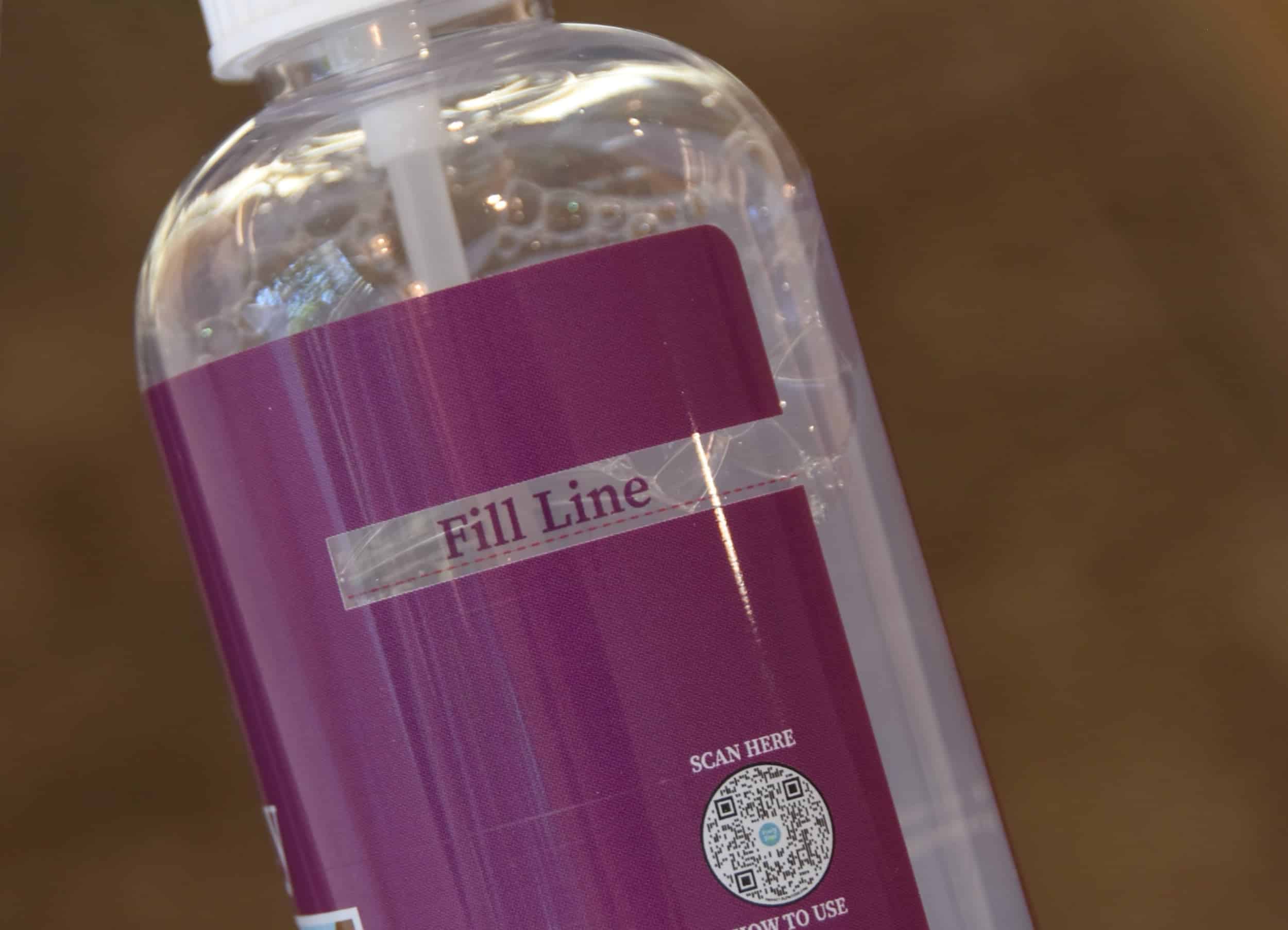 Reviewing how the Truly Free system works, specifically where the fill line is on the bottles so you can see how to fill the water, and then add the concentrate.