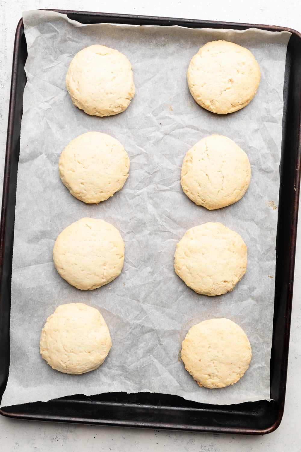 Gluten free shortcake biscuits on a pan.