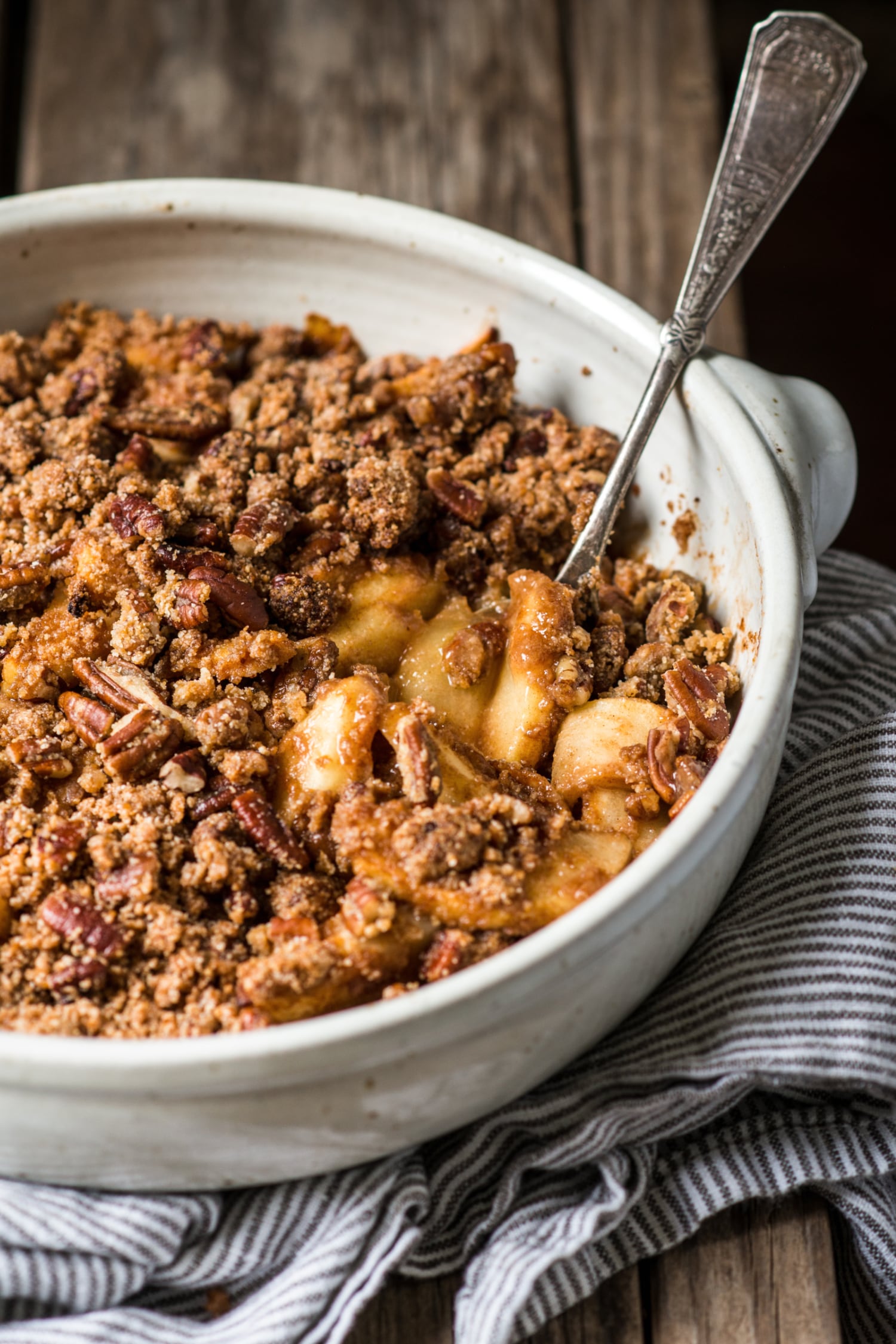Healthy apple crisp out of the oven and in a casserole dish.