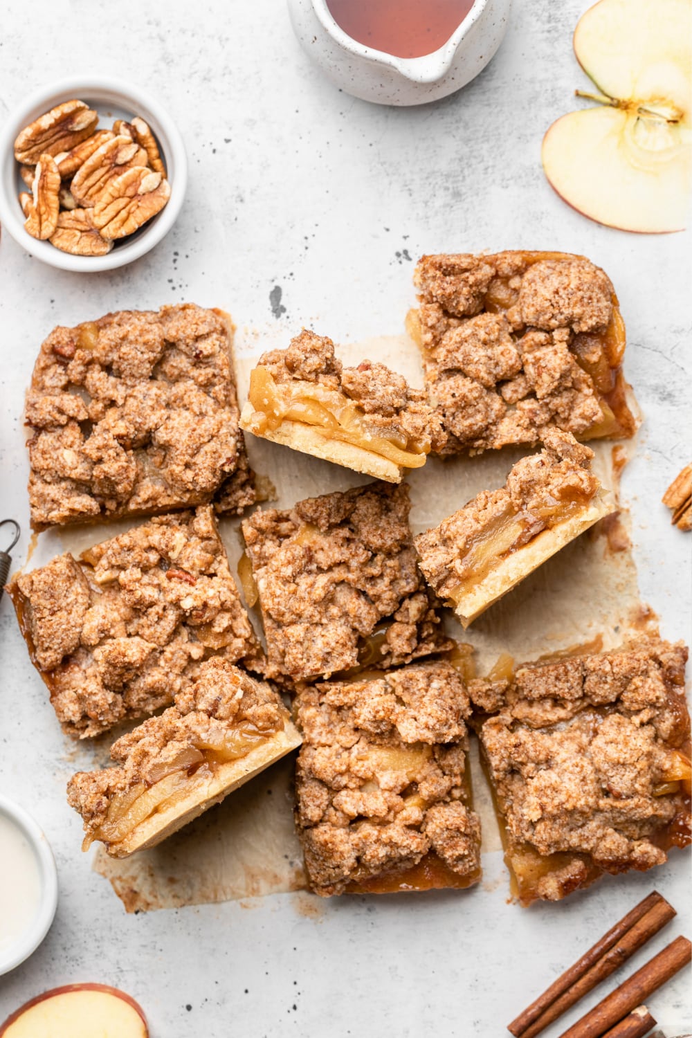 baked healthy apple pie bars cut into squares.