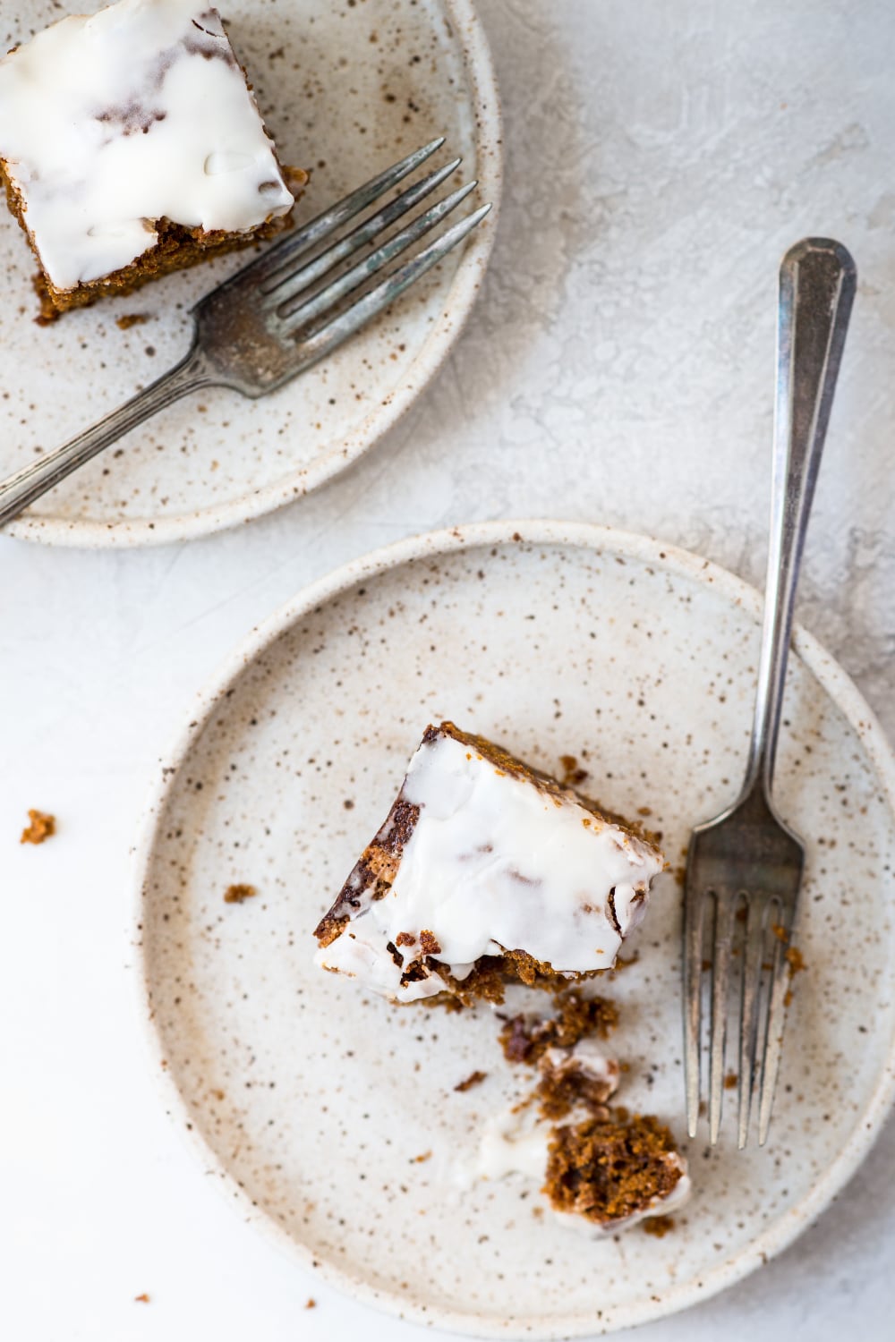 two plates of healthy gingerbread coffee cake