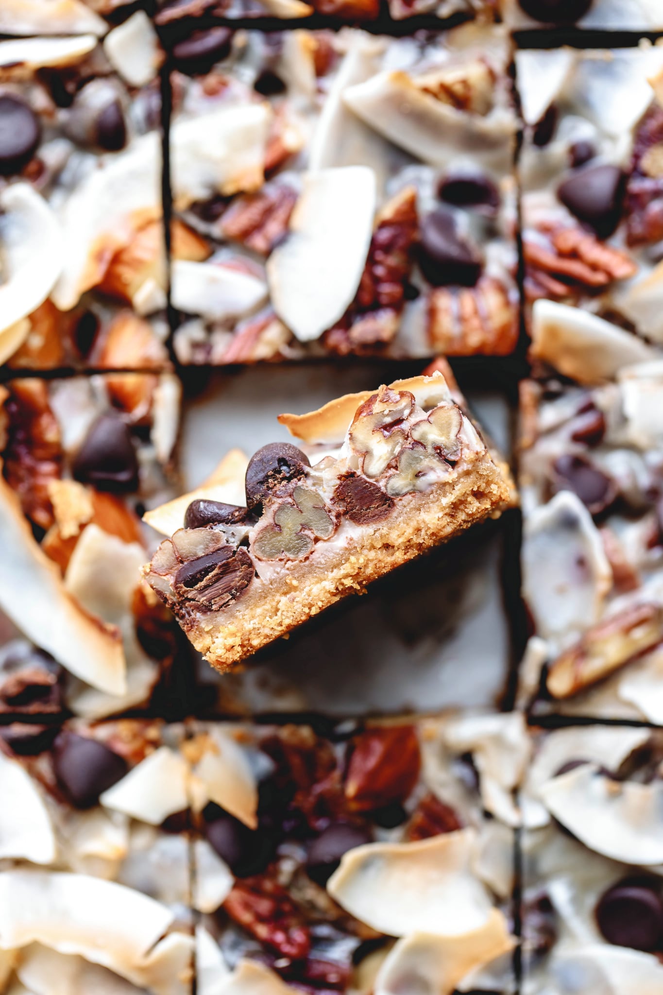 close up shot of the layers of healthy magic cookie bars