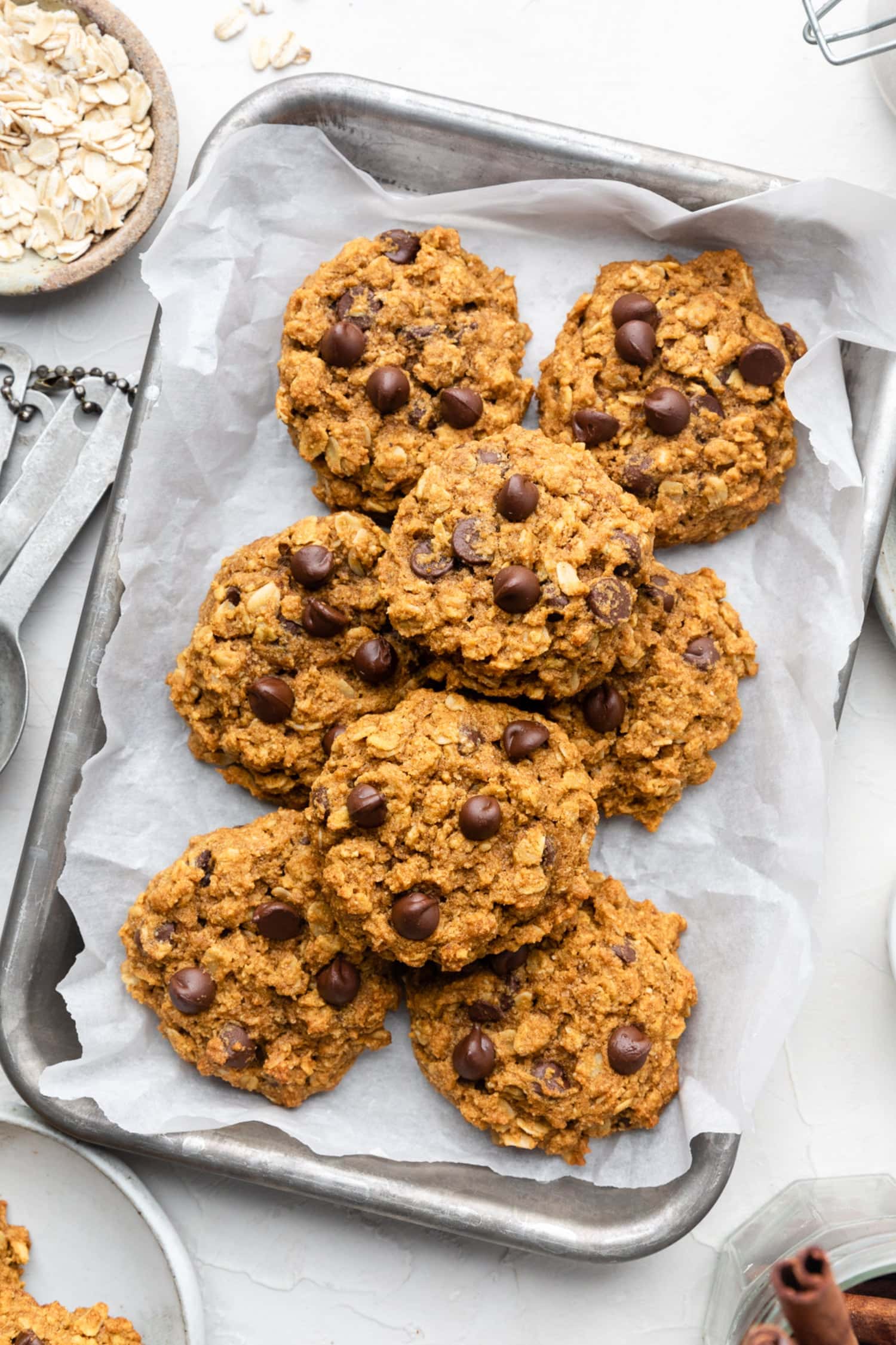 A large tray with pumpkin oatmeal cookies baked and ready to eat.