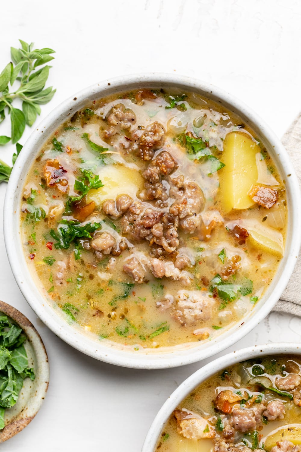two bowls of healthy zuppa toscana soup 