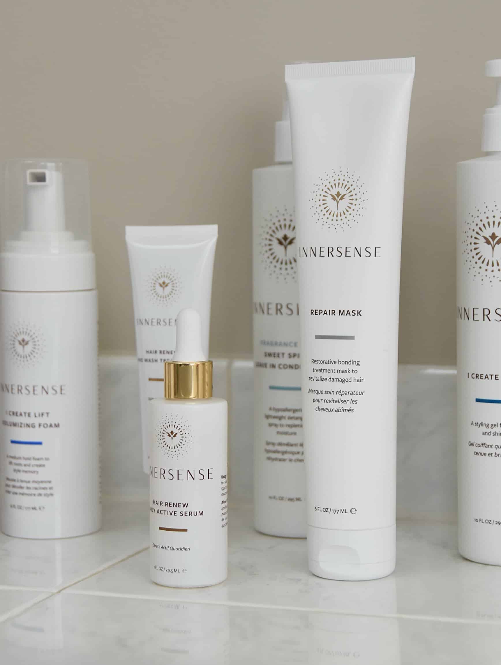 A few Innersense Hair products sitting on the bathroom counter.