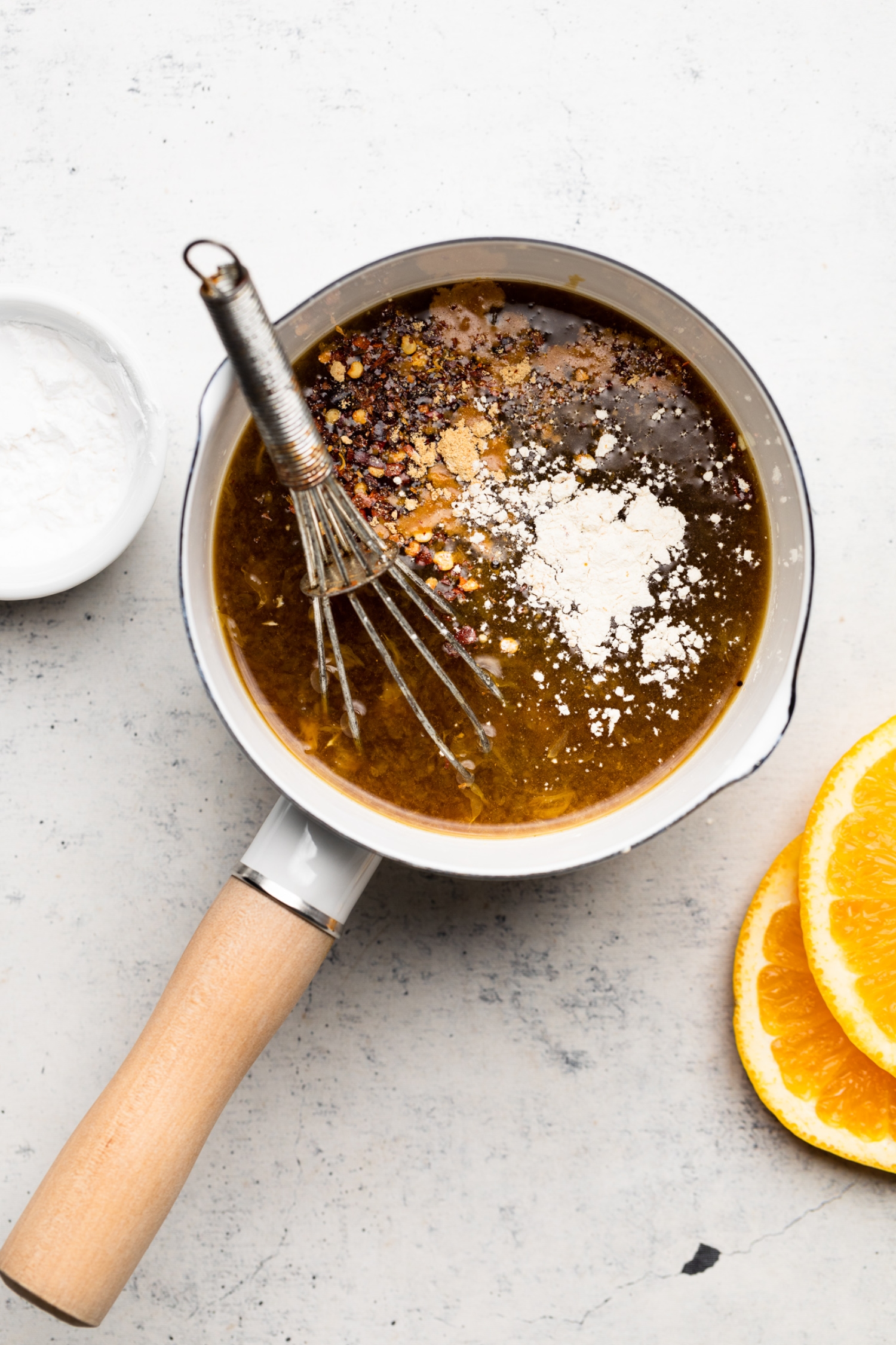 ingredients in a pan in this orange chicken sauce recipe