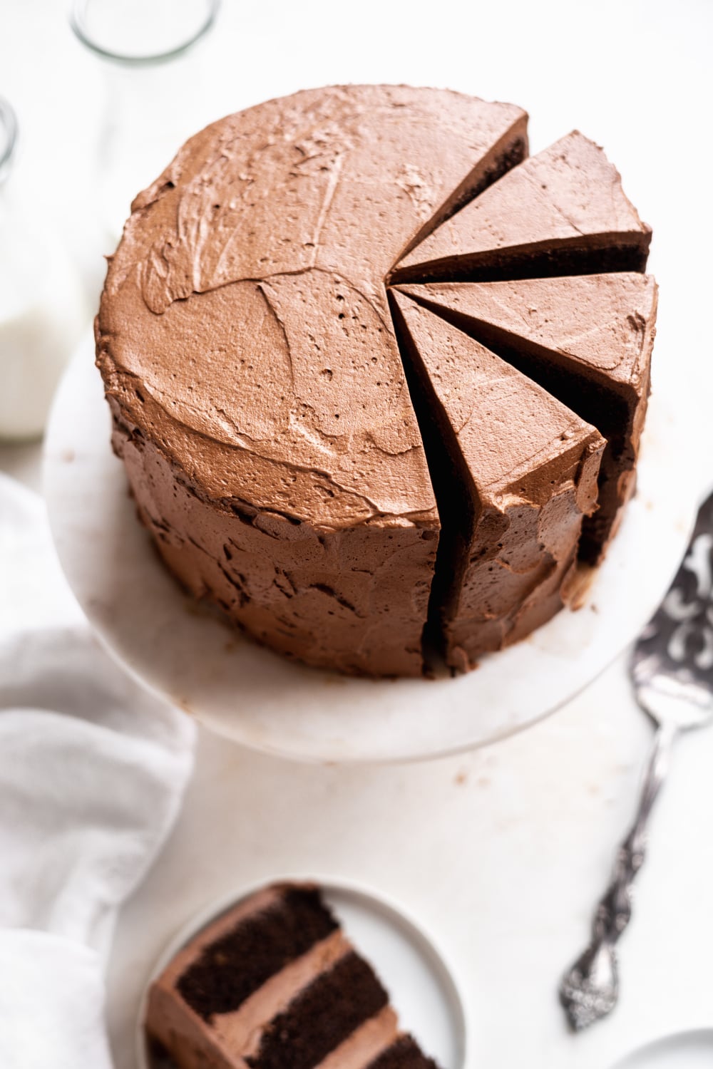 paleo chocolate cake sliced into three slices