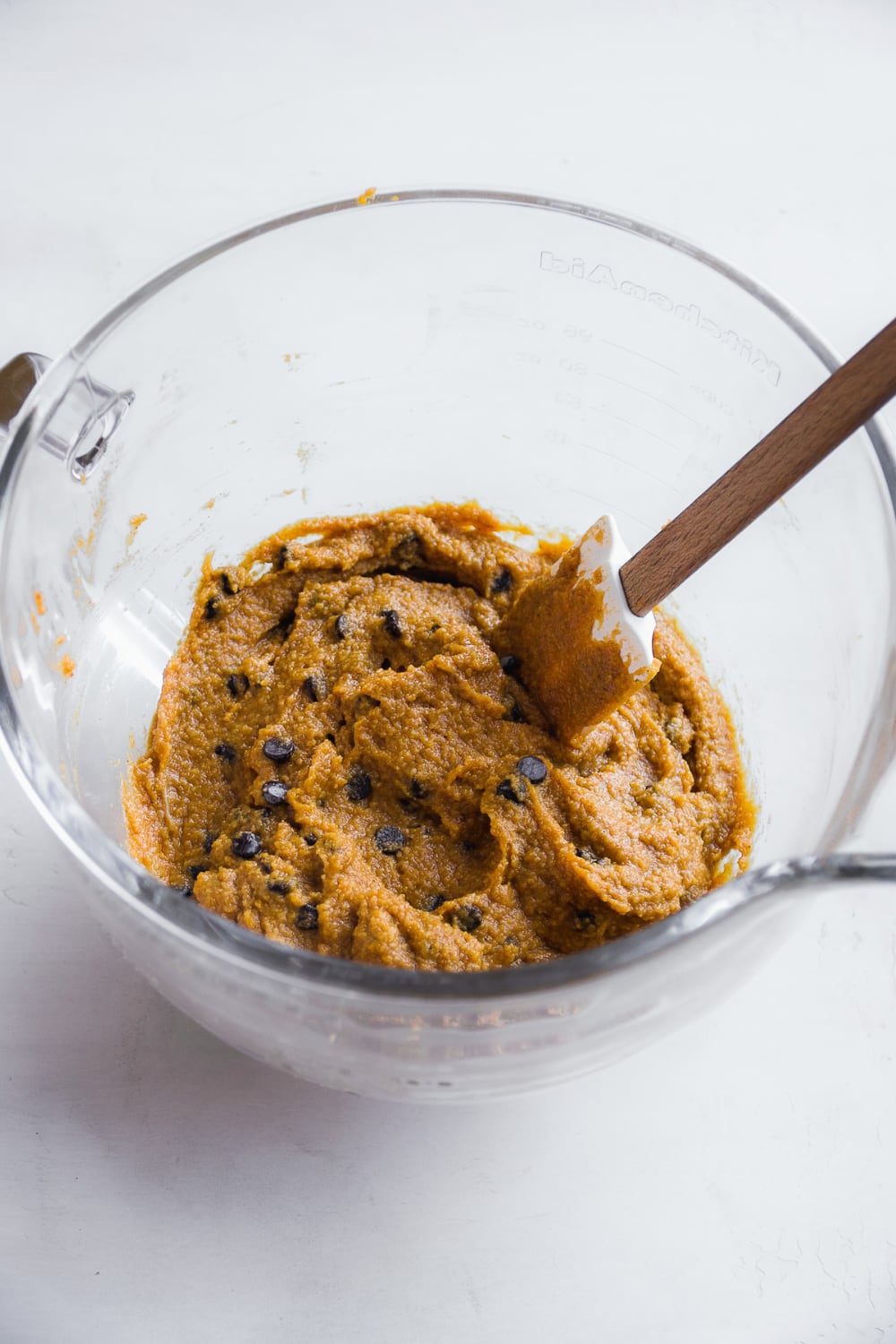 batter for healthy pumpkin bread in a mixing bowl