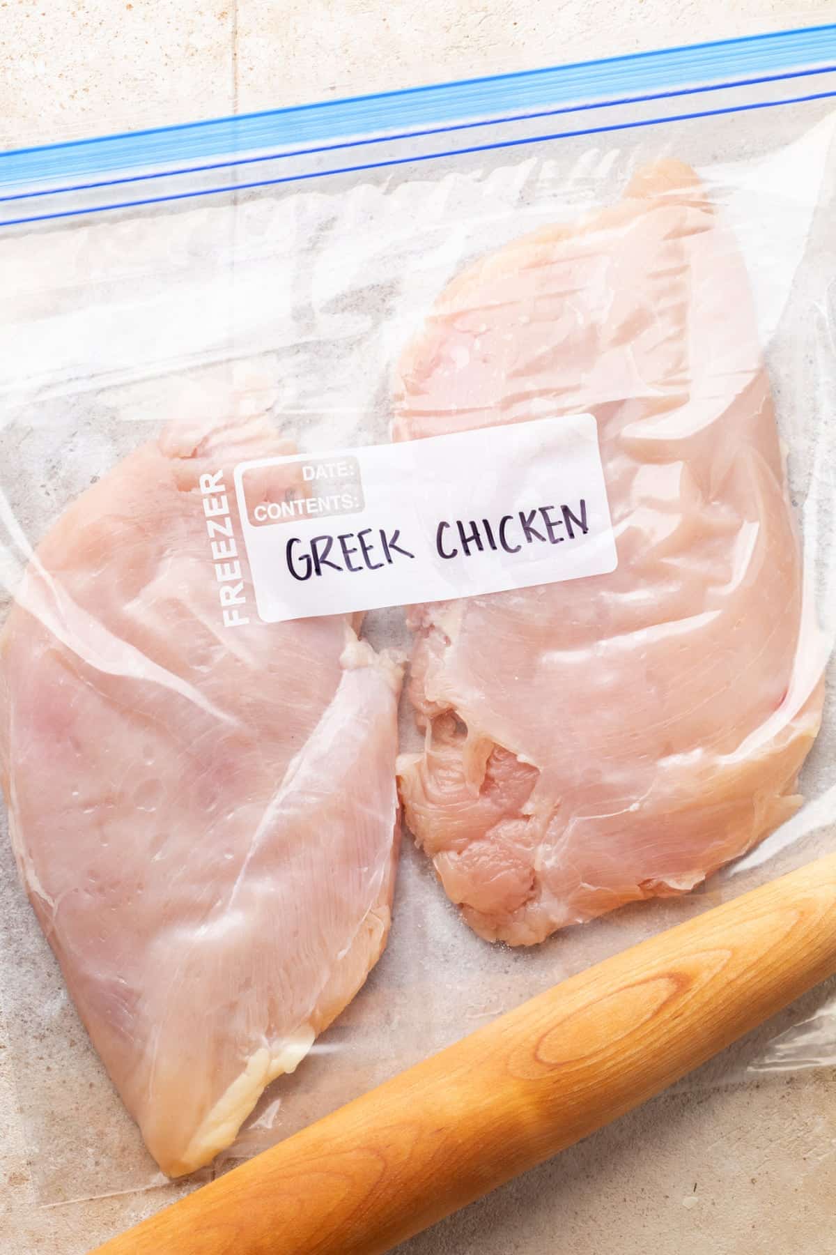 Chicken in a bag pounded down to a 1/2 inch thickness to help tenderize it.