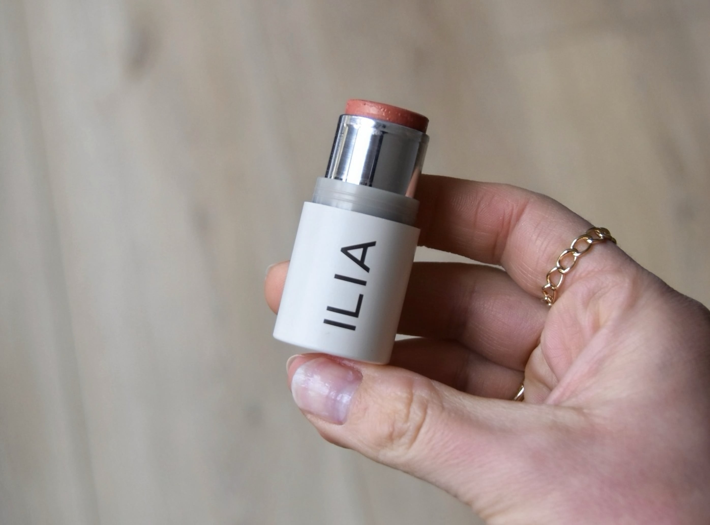 Holding the Multi-Stick and showing the shade.