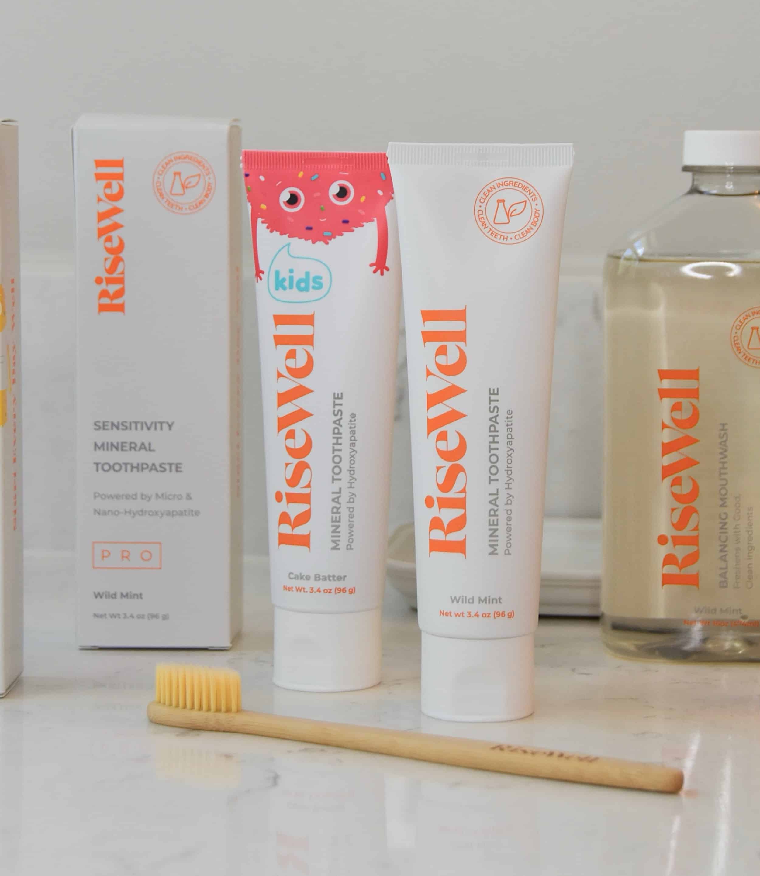 Two bottles of the RiseWell toothpaste, including the mineral toothpaste and kids mineral toothpaste.
